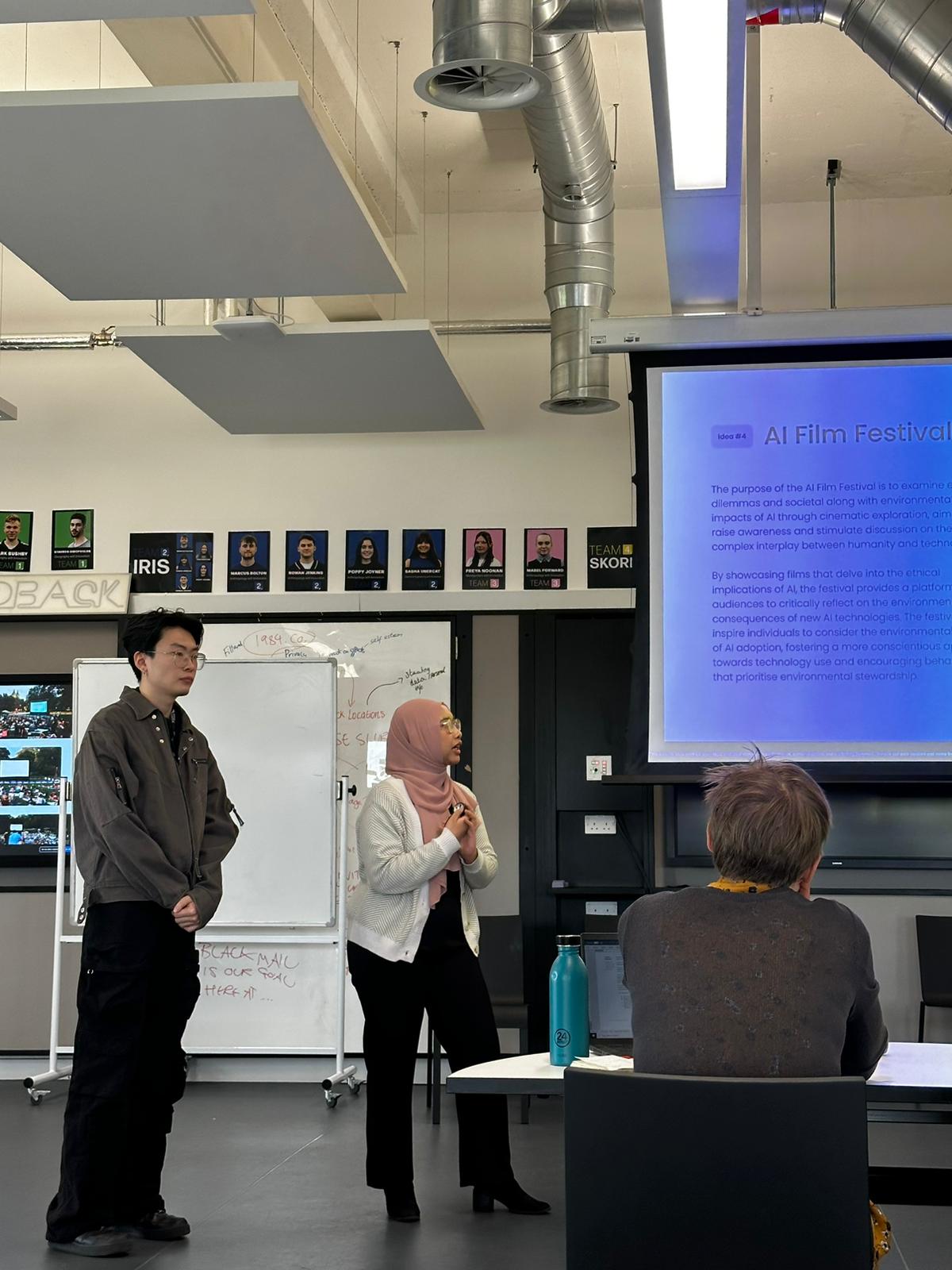 Amira presenting her designs